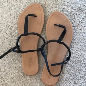 Black thong toe sandals